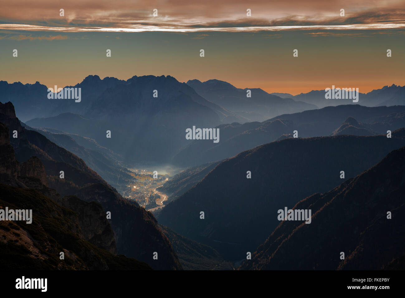 River Ansiei valley with city Auronzo in the morning light, in the back Dolomites, from the Auronzohütte, Province of Belluno Stock Photo