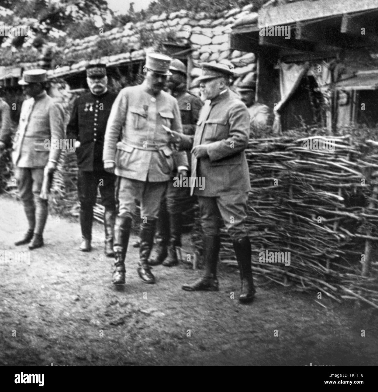 Raymond Poincare, President of the French Republic and Joseph Joffre, Marshall of France and Commander-in-Chief of it's armies, visiting officers' quarters during the Great Battle of the Somme in France, July 1916. Stock Photo