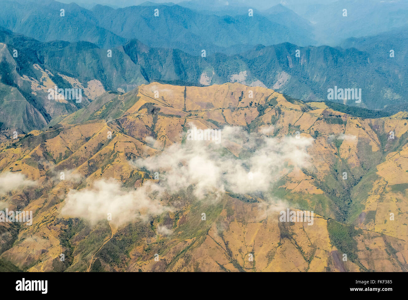 Aerial view from window plane of Andes mountains Stock Photo