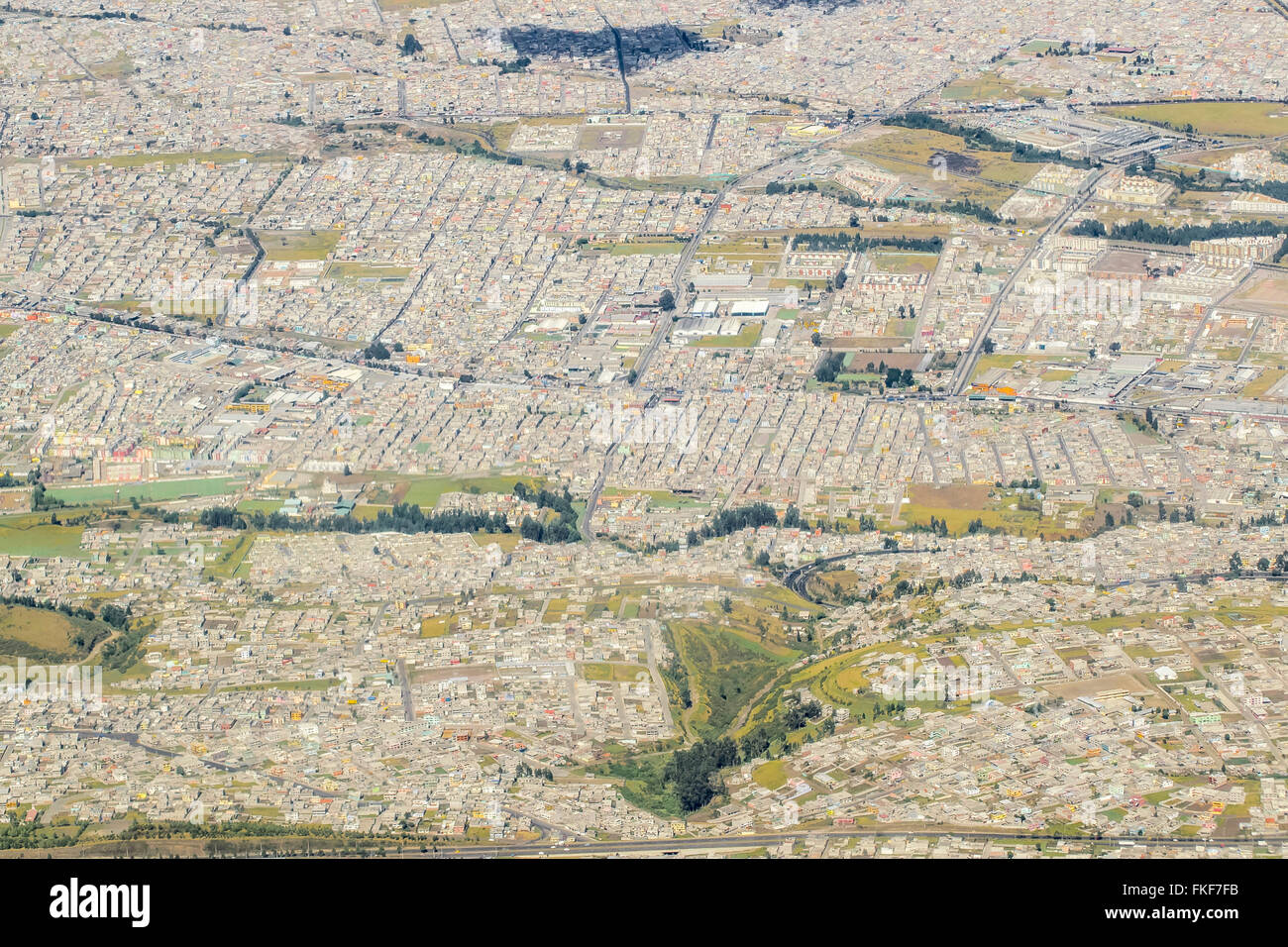 Aerial view of the outsides of the capital of Ecuador, Quito from window  plane arriving to the airport. Stock Photo