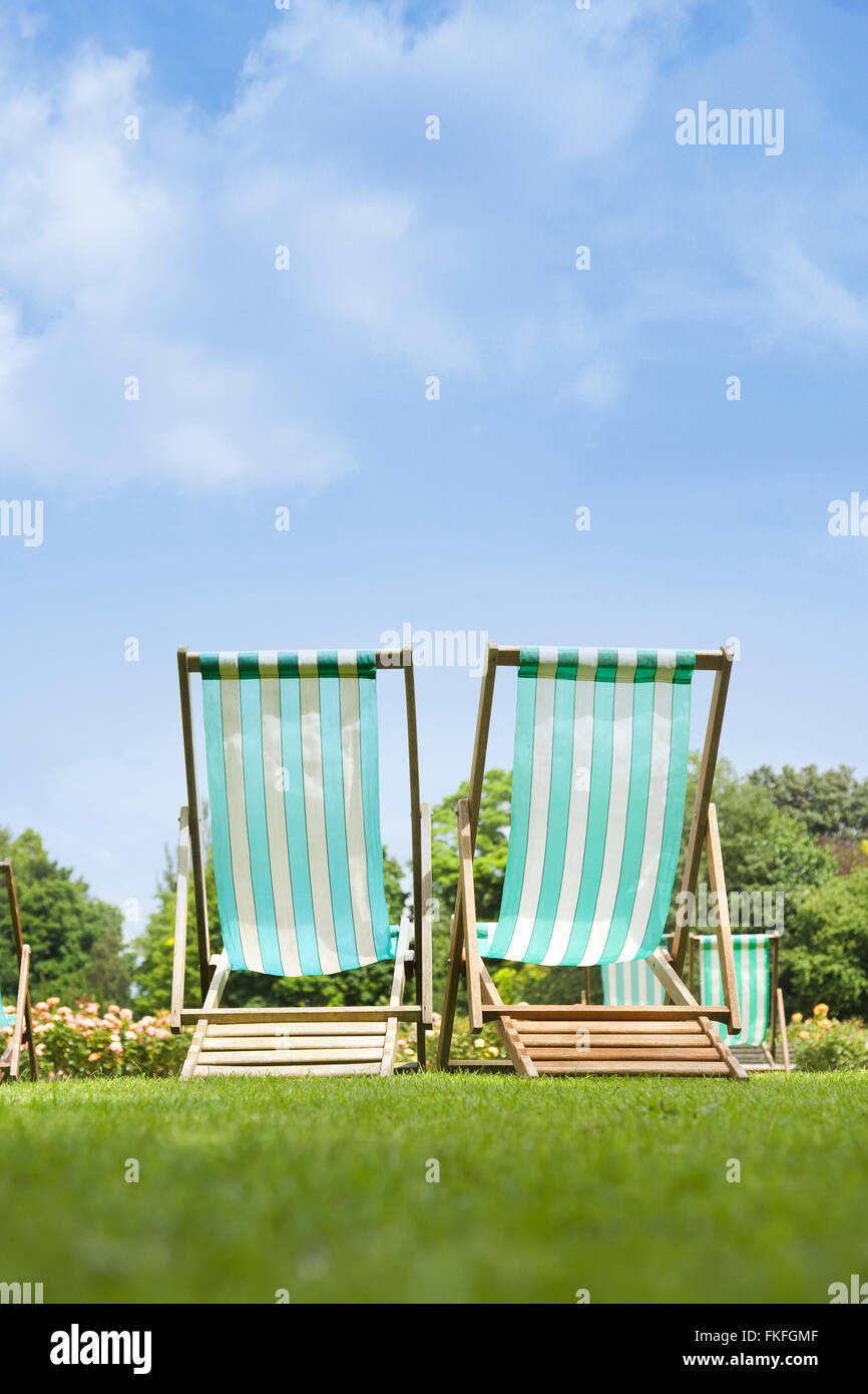 Deck chairs in the park Stock Photo Alamy