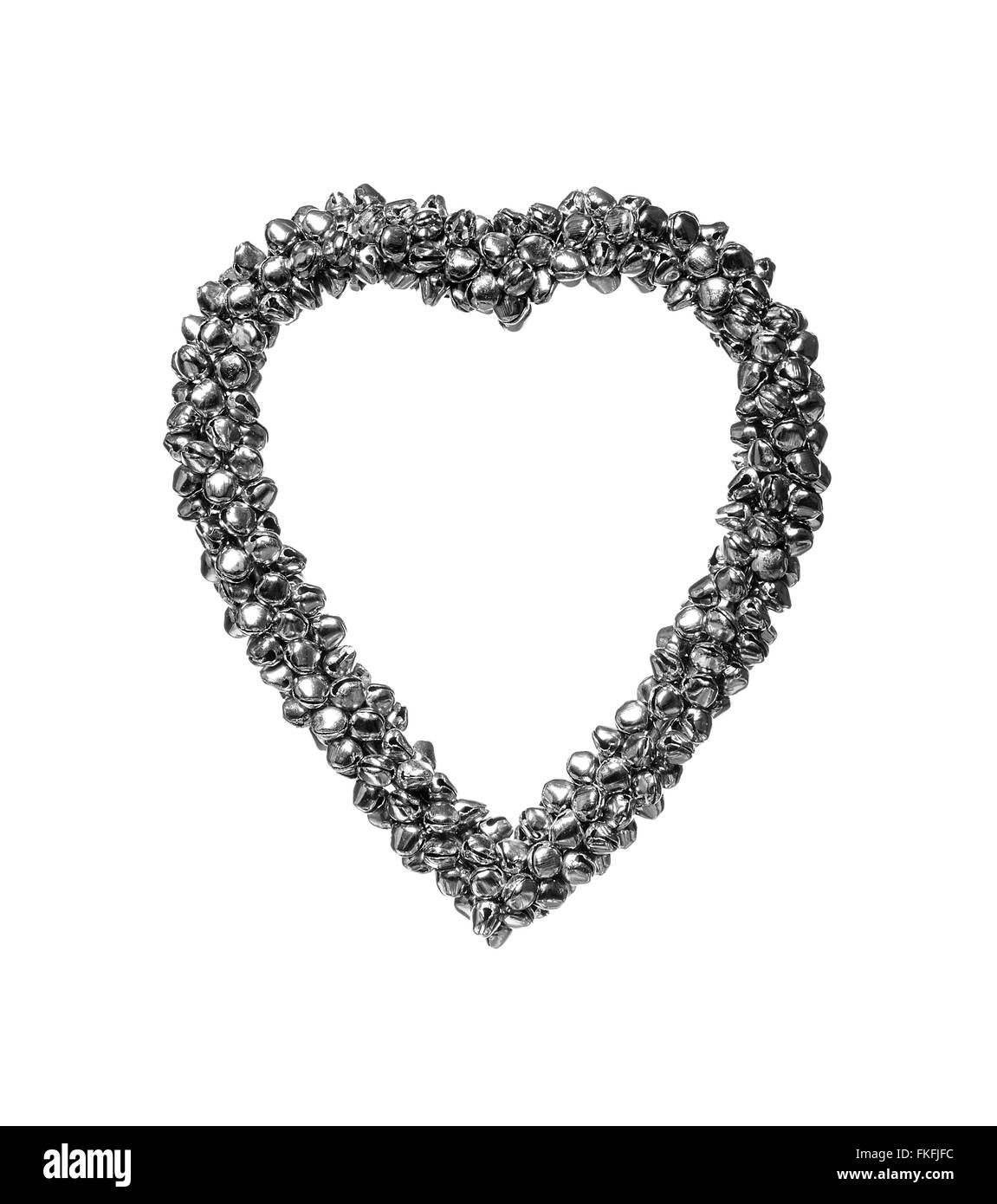 Iron heart on a white background. Stock Photo