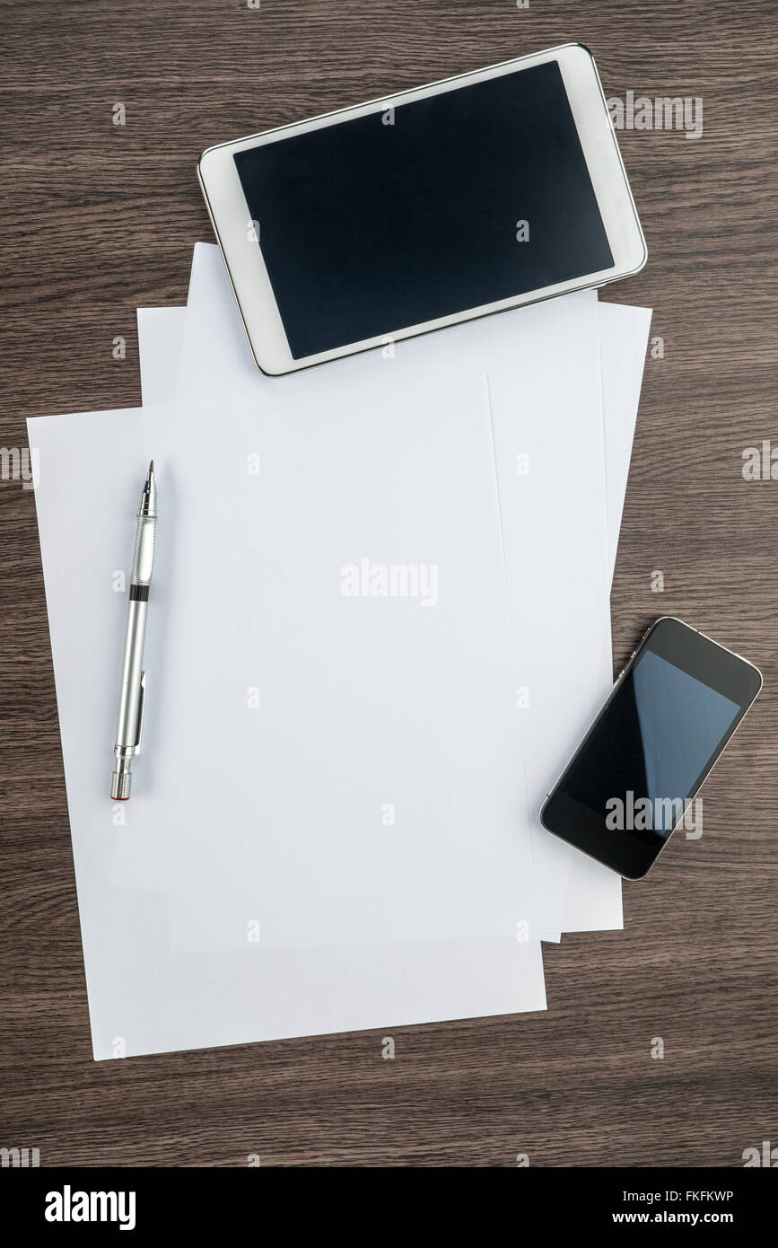Smart Phone,tablet, paper and drawing pen on the desk Stock Photo Alamy