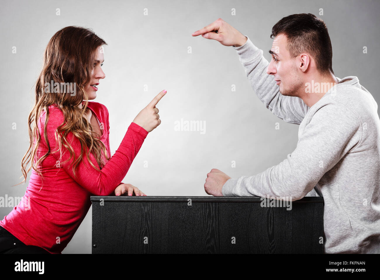 Happy couple having fun and fooling around. Joyful man and woman have ...