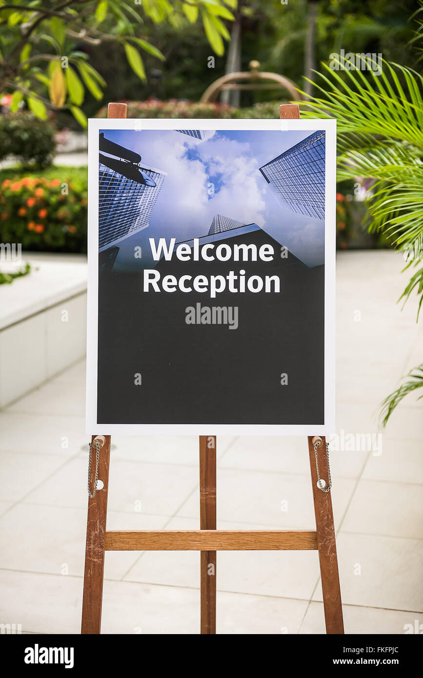 reception sign board on wooden stand Stock Photo Alamy