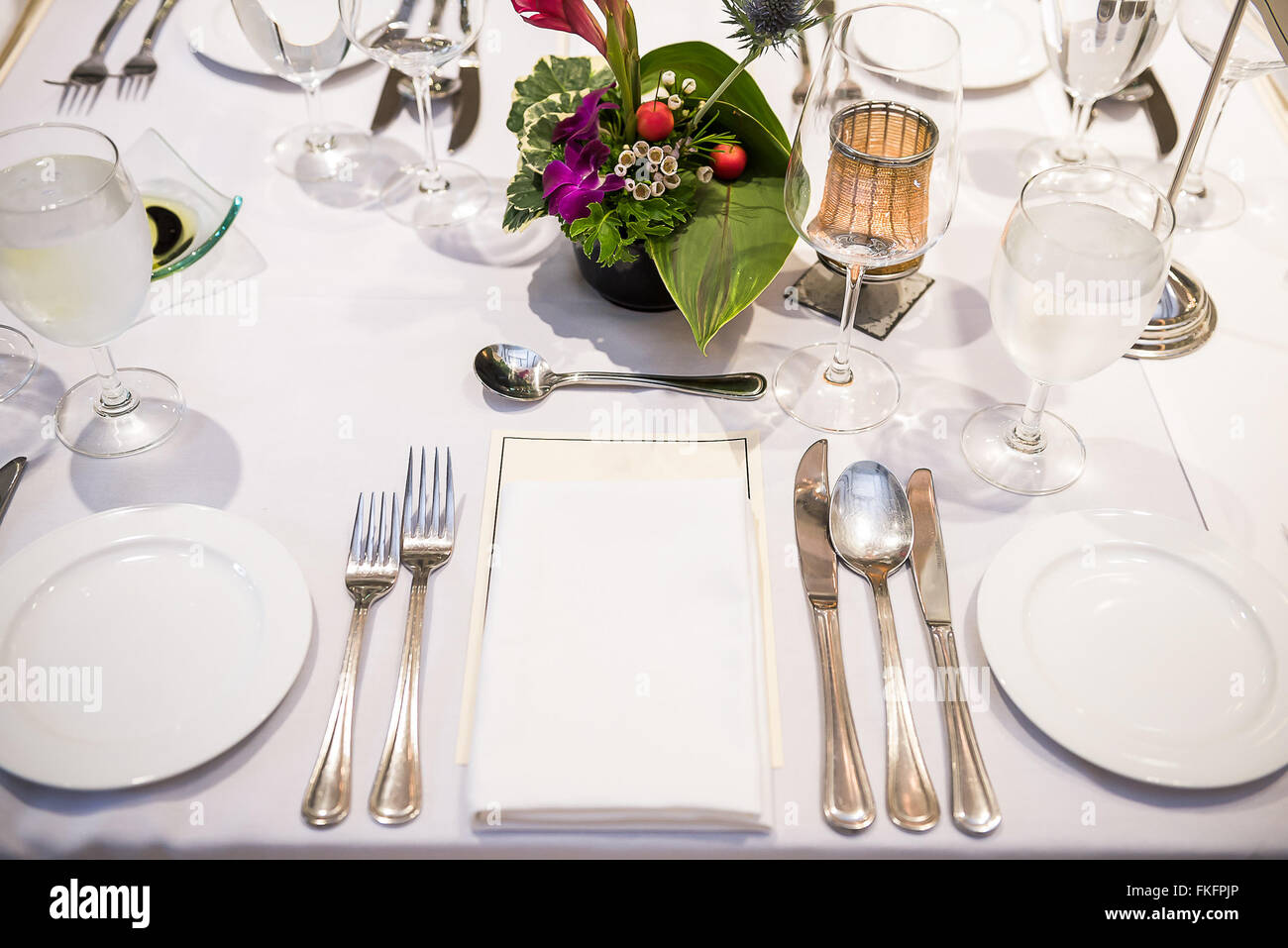 Table set up with cutlery for meal. Stock Photo