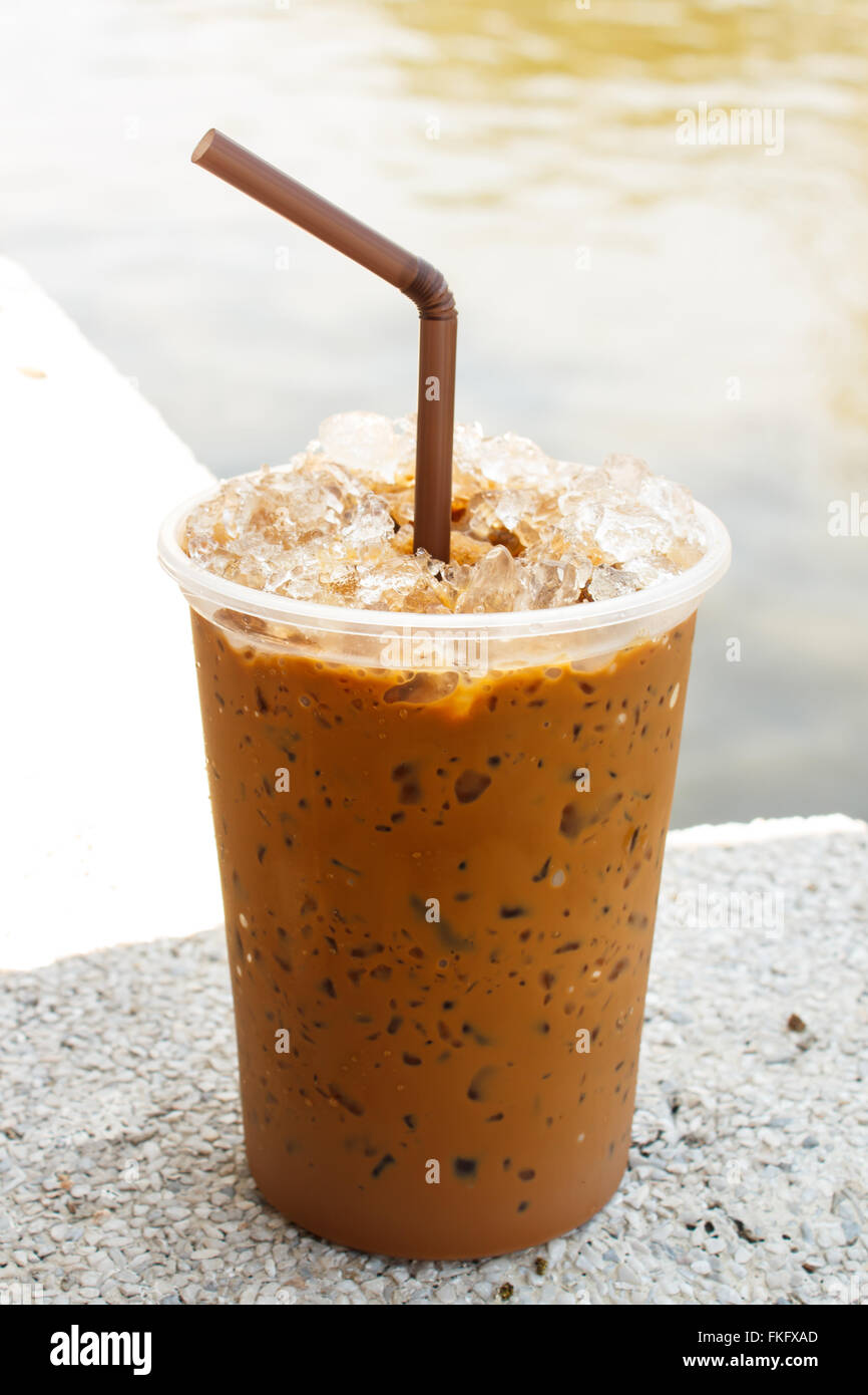 iced coffee with straw in plastic cup Stock Photo Alamy