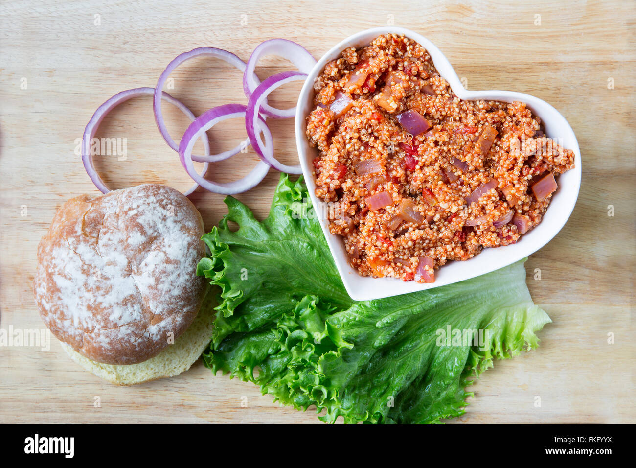 Heart healthy vegan sloppy joe sauce made with quinoa, with a bun