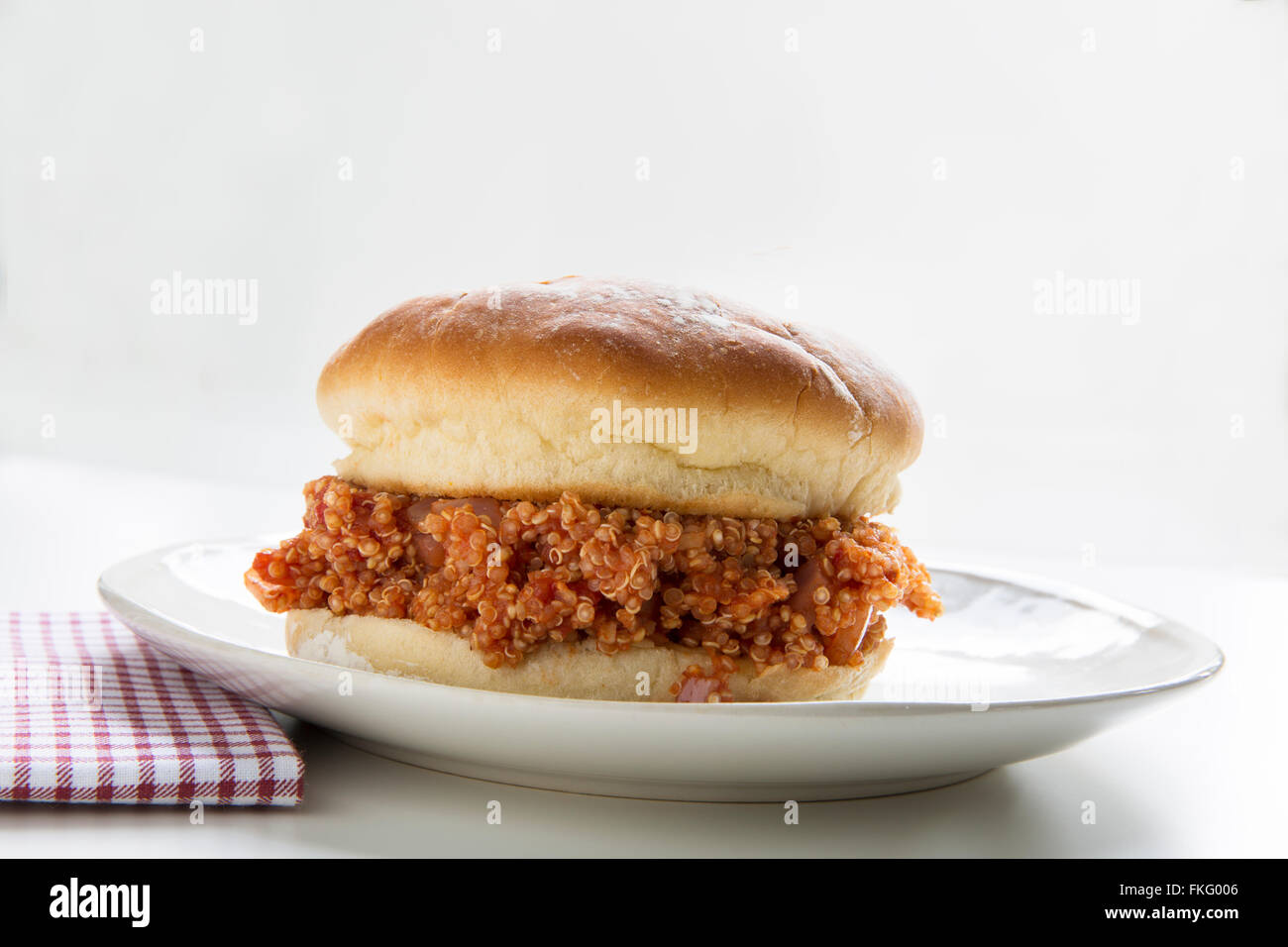 Healthy vegan quinoa sloppy Joe, just as messy as the meat version. Stock Photo