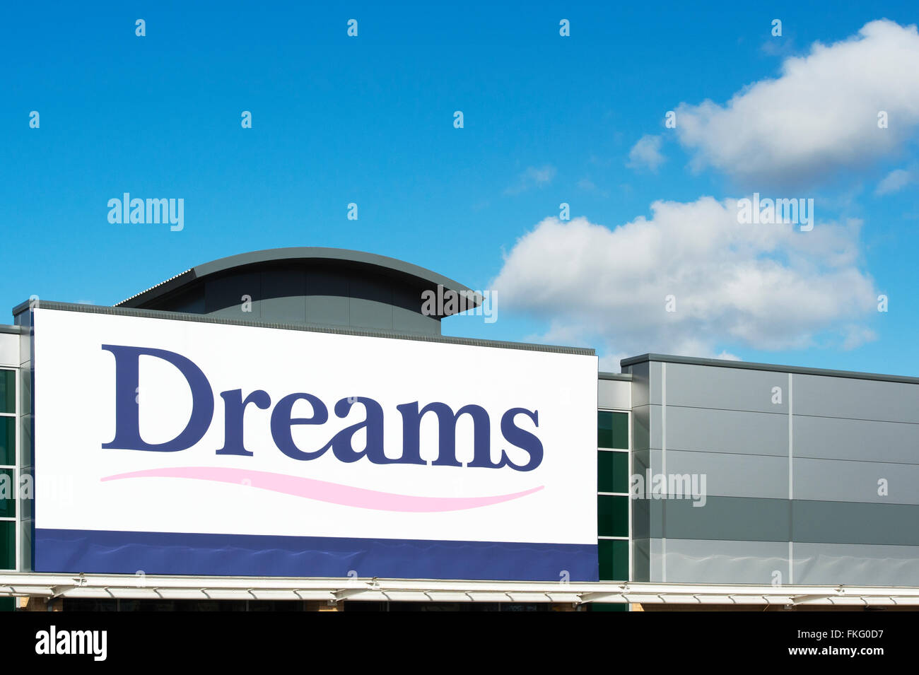Dreams bed store sign against a blue sky. Milton Keynes
