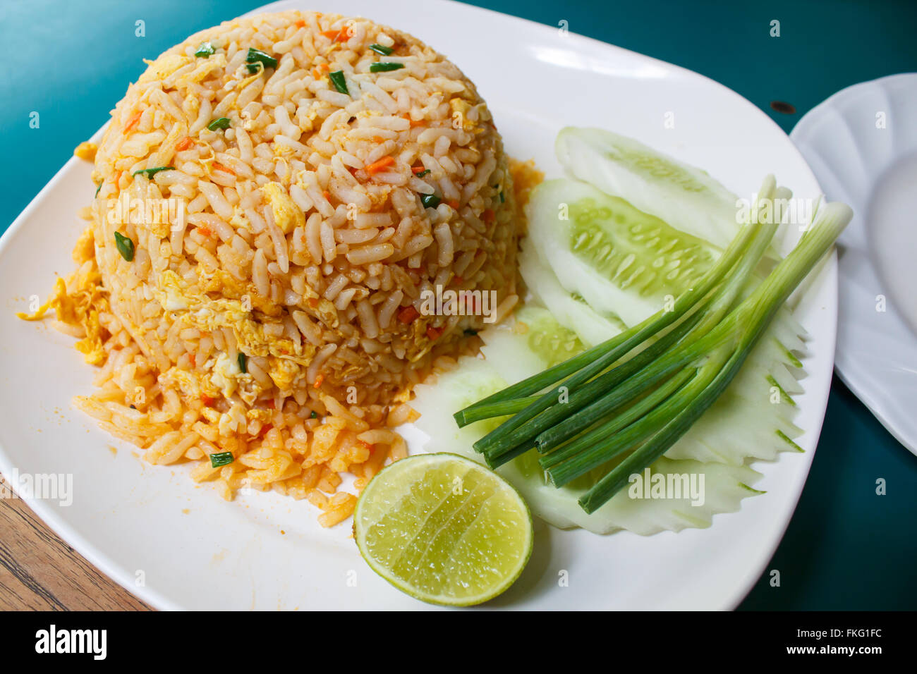 fried rice and vegetables at restaurant, thai style Stock Photo - Alamy