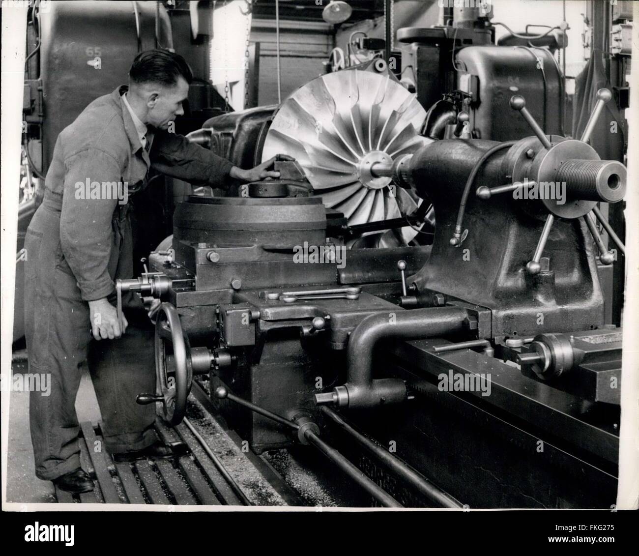 1957 - Working On A Goblin Jet Engine: Form turning animpeller of a Goblin Jet, one of the hundreds of operations that go into making these units which power the Vampire fighter planes of the R.A.F. Airplane engine jet plane © Keystone Pictures USA/ZUMAPRESS.com/Alamy Live News Stock Photo
