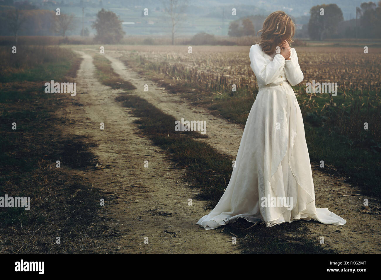 Beautiful woman with bride dress . Sadness and melancholy Stock Photo