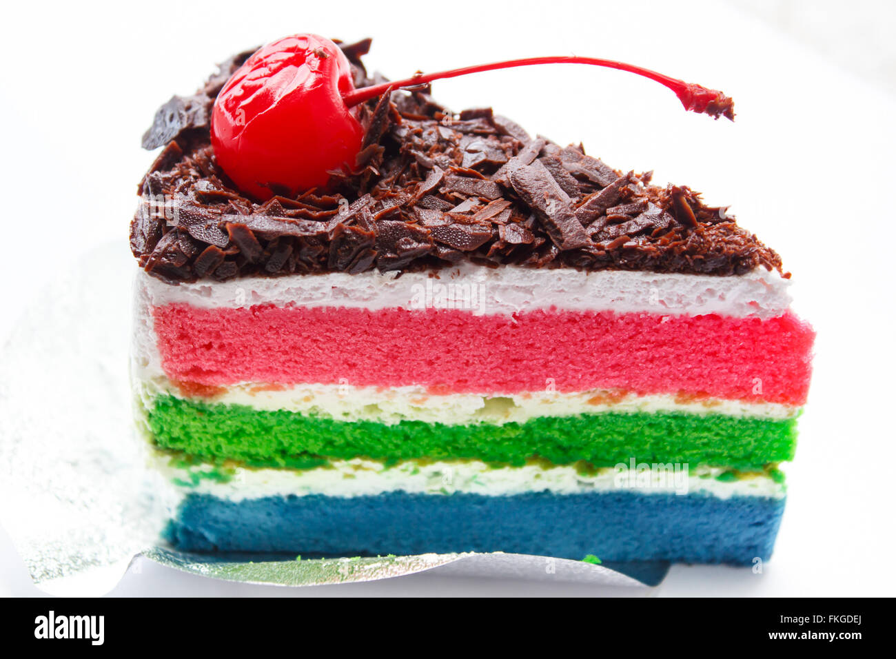 Delicious homemade rainbow layer cake with cup of coffee Stock Photo  Alamy