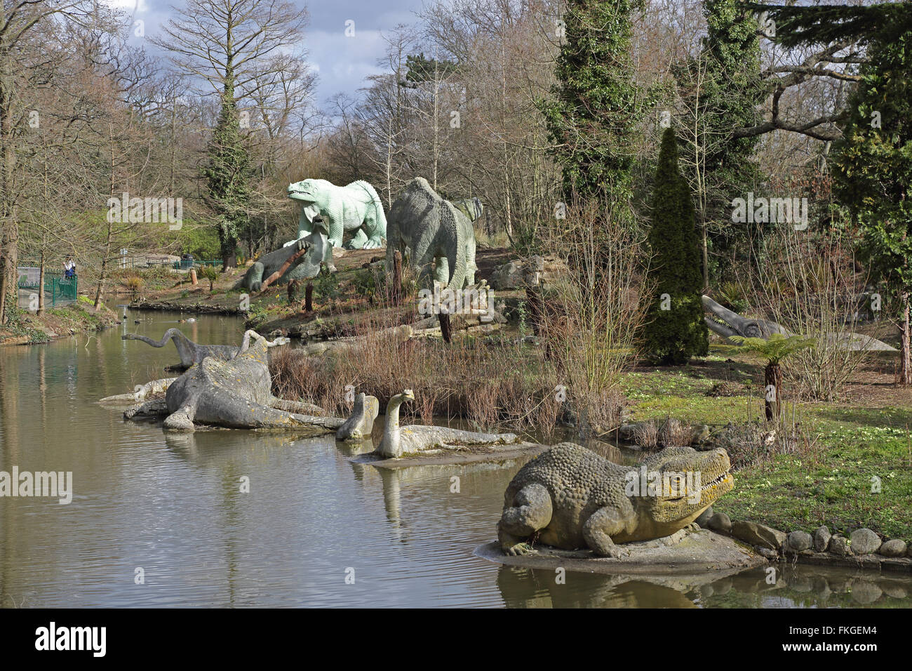 Life-size dinosaur statues in Crystal Palace Park, London. Erected as part of the Great Exhibition in 1854 Stock Photo