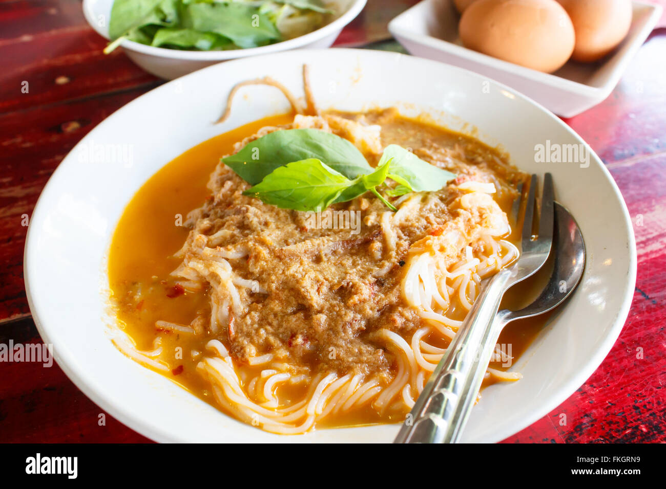 Kanom jeen namya (white noodles with fish curry sauce), thai food. Stock Photo