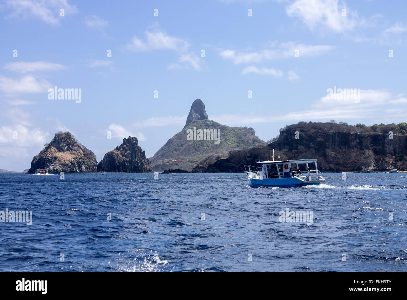 Two Brothers, Pico Hill and the waters of Fernando de Noronha, Brazil. Stock Photo