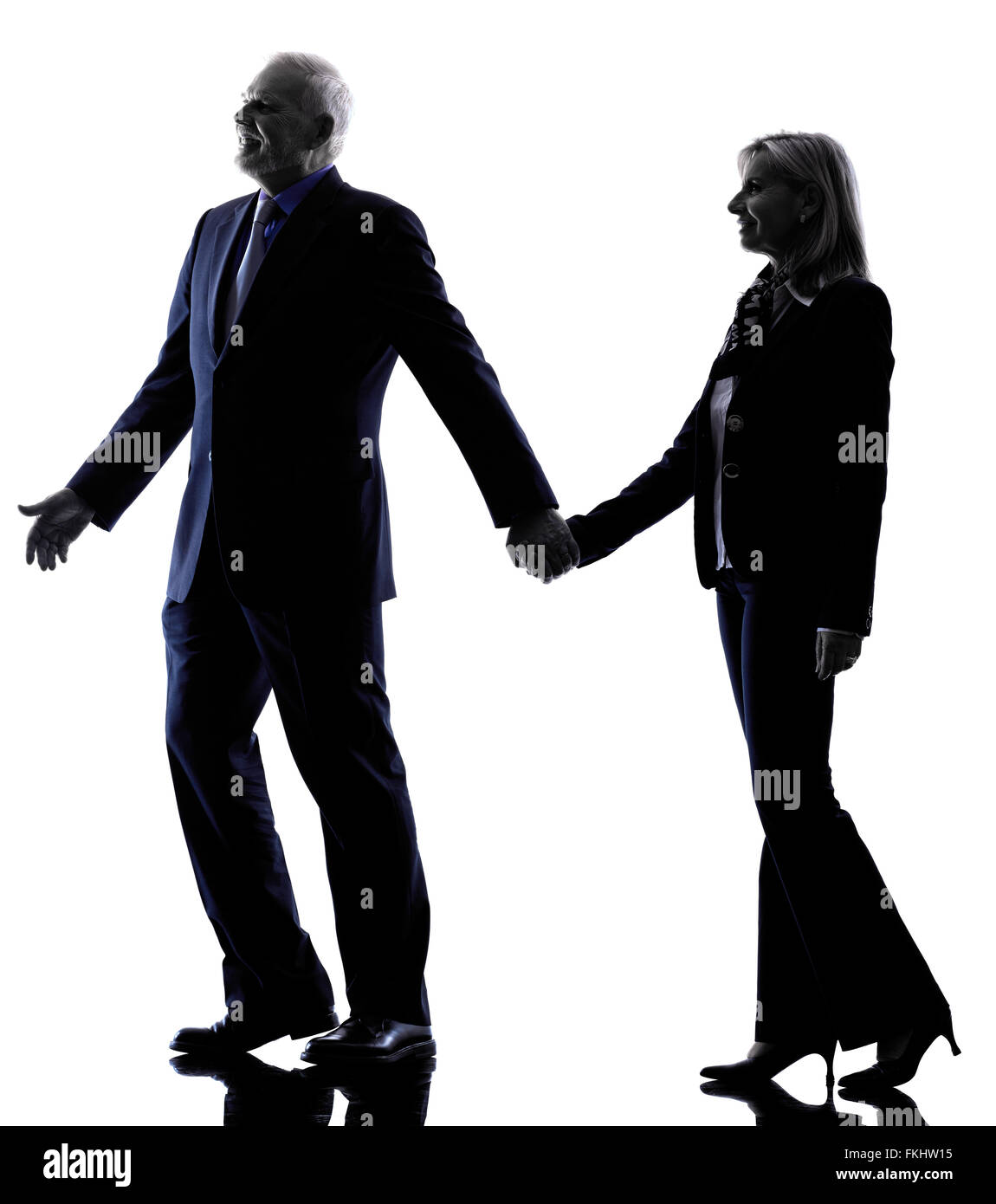 one caucasian couple senior silhouette in silhouette studio isolated on ...