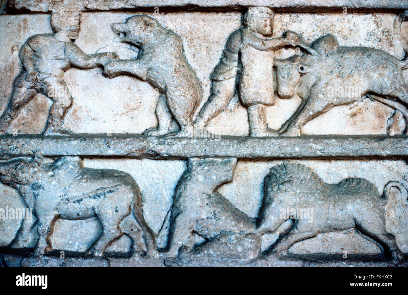 Carved Graeco-Roman Marble Animal Frieze including Blood Sports, Bear Baiting, and a Gladiator Bull Fight, from Pergamon, Turkey Stock Photo