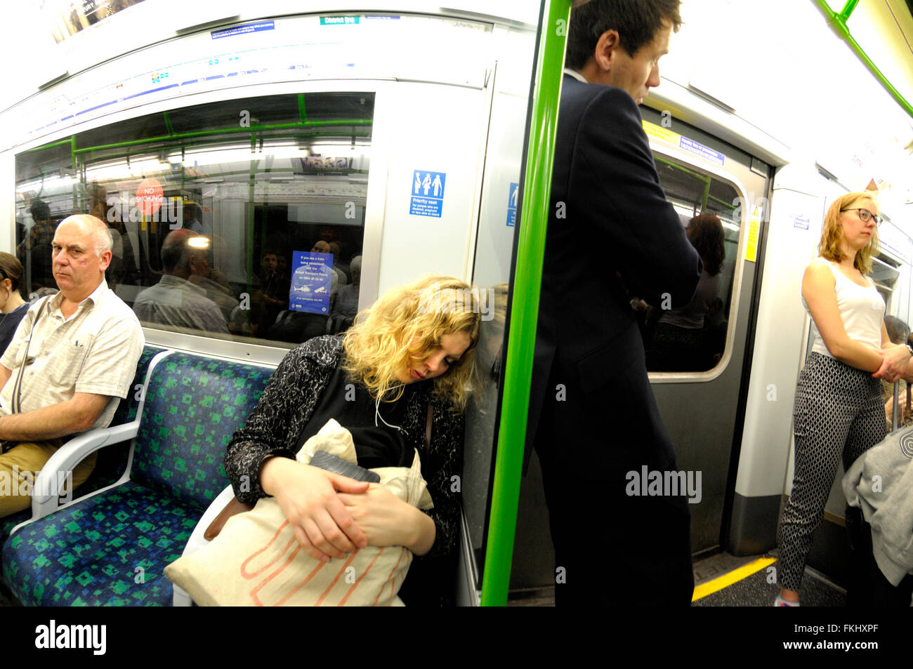 People sleeping on train hi-res stock photography and images - Alamy