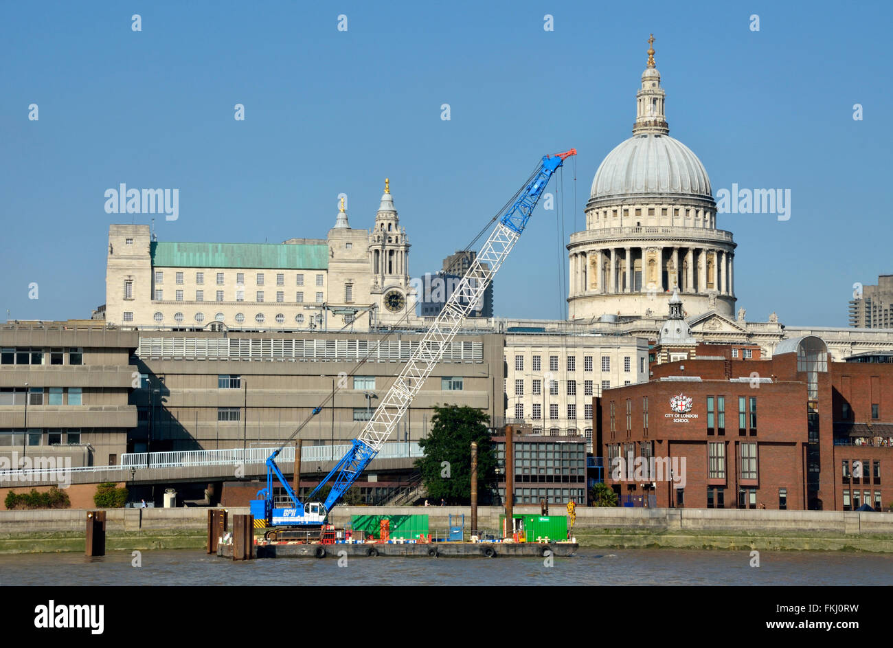 London, England, UK. BPH construction crane on the River Thames by St Paul's Cathedral Stock Photo