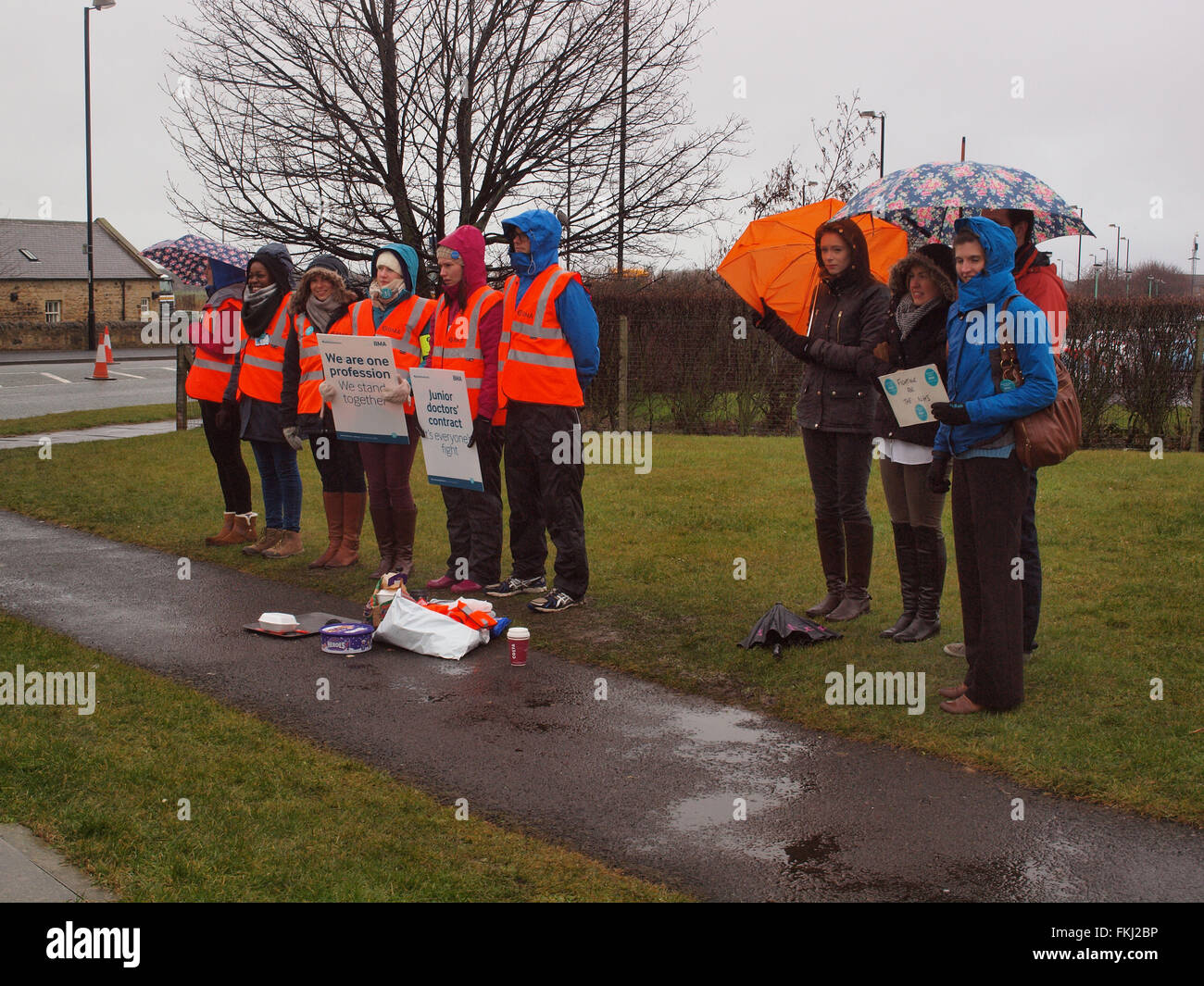 Newcastle Upon Tyne, Wednesday March 9th 2016, UK News. Junior doctors walk out in the pouring rain on a 48 hour strike outside Rake Lane Hospital in North Tyneside. Credit:  james walsh/Alamy Live News Stock Photo