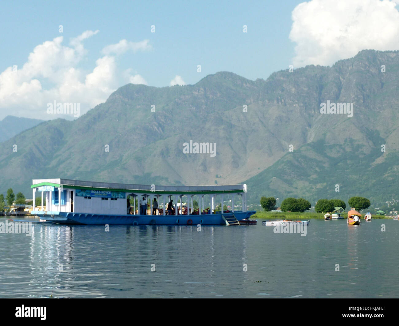 House boat on  Dal Lake, Srinagar, Kashmir, center of sports activities mainly swimming equipment, motor boat rides and shikara Stock Photo