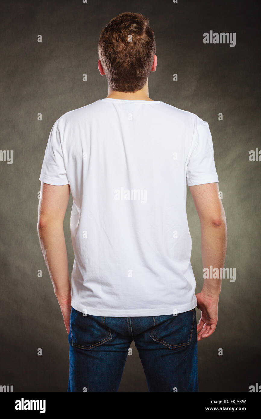 Back rear view of fashionable man in white blank shirt with empty copy ...