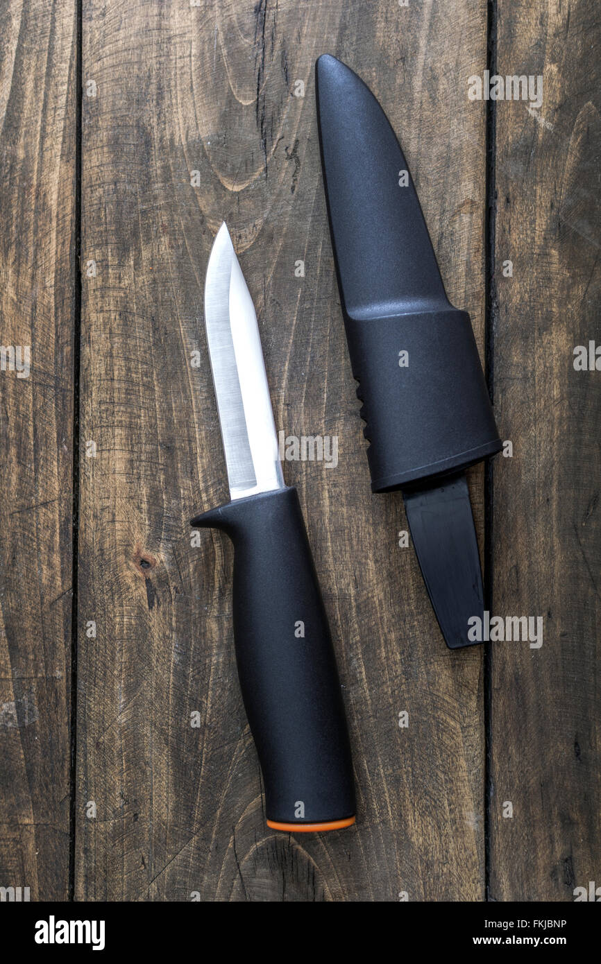 Knife with the plastic handle and a sheath, from above Stock Photo Alamy