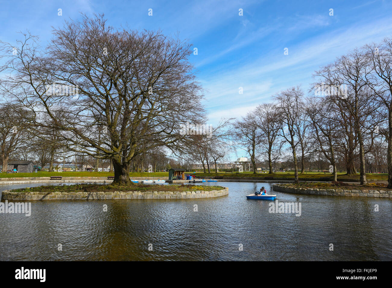 Pedal boats on the traditional boating pond within Duthie Park in the city of Aberdeen, Scotland, UK Stock Photo
