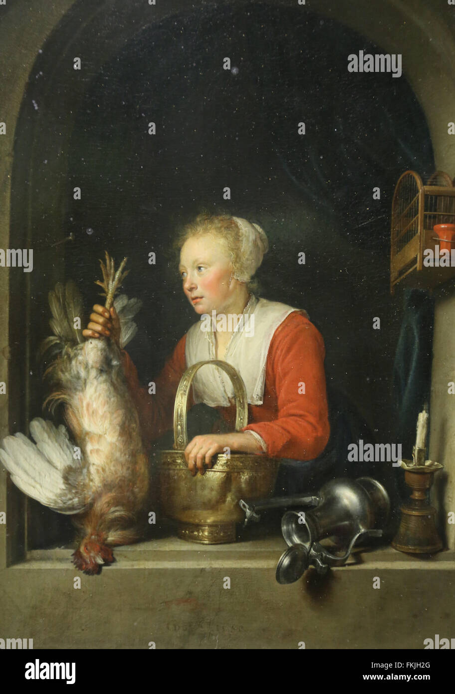 Gerad Dou (1613-1675). Dutch painter. Woman hanging a rooster in her windows or Dutch housewife 1650. Louvre Museum. Paris. Stock Photo