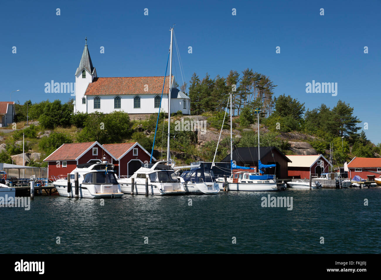 Church and harbour on river, Hamburgsund, Bohuslän Coast, Southwest Sweden, Sweden, Scandinavia, Europe Stock Photo
