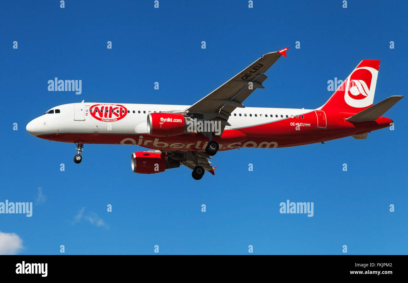 A Niki Airbus A320-214 approaching to El Prat Airport in Barcelona, Spain  Stock Photo - Alamy