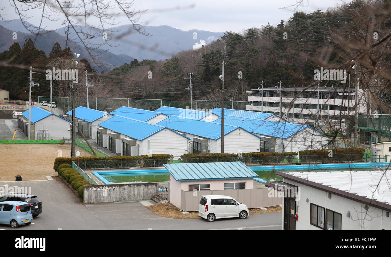(160309)-- TOKYO, March 9, 2016(Xinhua)-- Photo taken on March 5, 2016 shows the view of temporary houses for evacuees of the earthquake of March 11, 2011 in Iwate, Japan. As the five-year intensive reconstruction period approaches its deadline in late March, the Japanese Tohoku region devastated by a monstrous earthquake-triggered tsunami on March 11, 2011 is still struggling to be revitalized, with a declining population making the huge projects ever harder to complete. (Xinhua/Liu Tian)(azp) Stock Photo