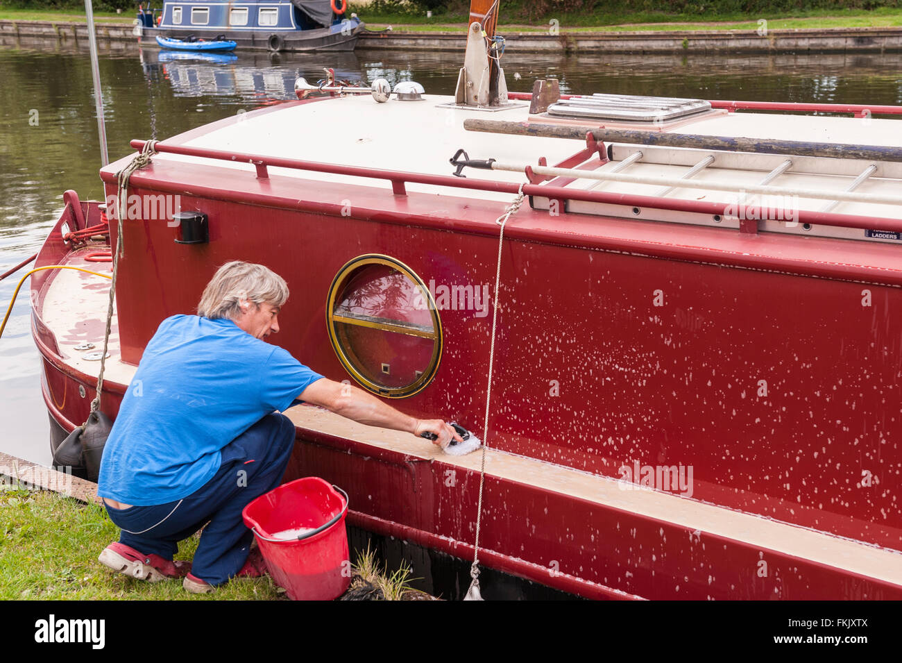Washing a boat hires stock photography and images Alamy