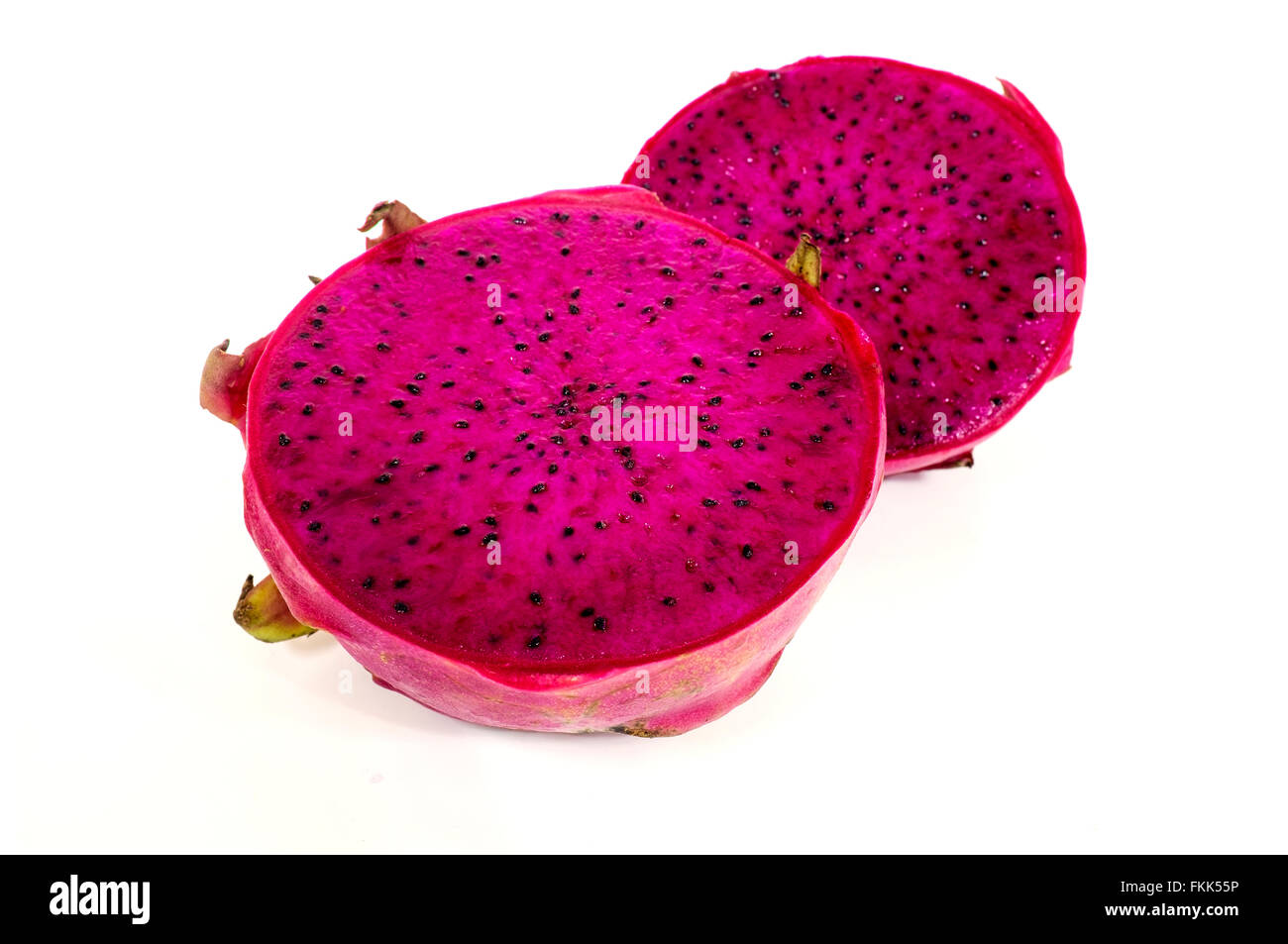 Sliced red pitahaya on a white background Stock Photo