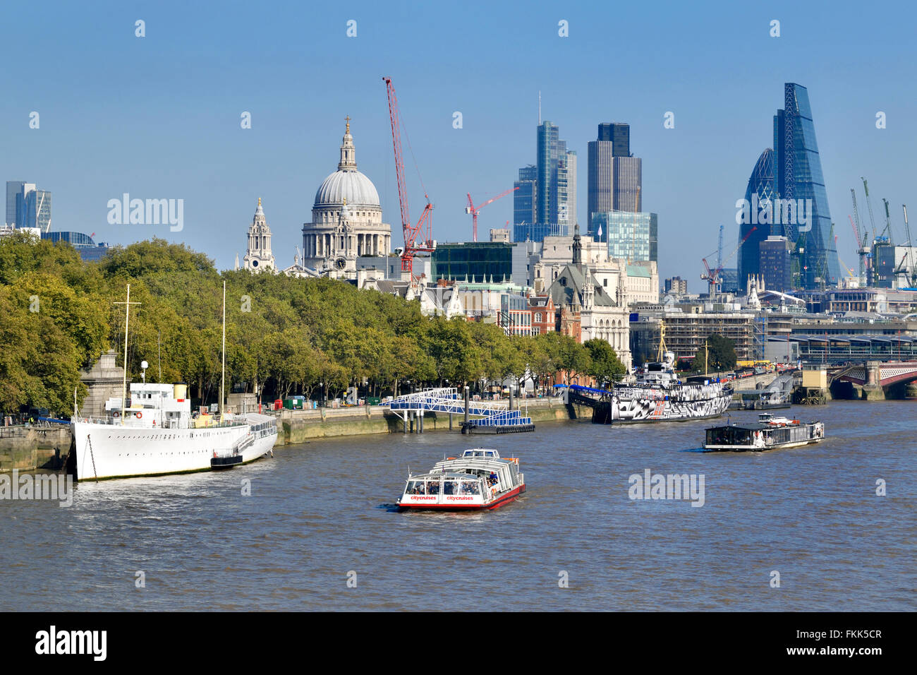 London, England, UK. Citycruises tourist boat on the Thames near St Paul's Cathedral Stock Photo