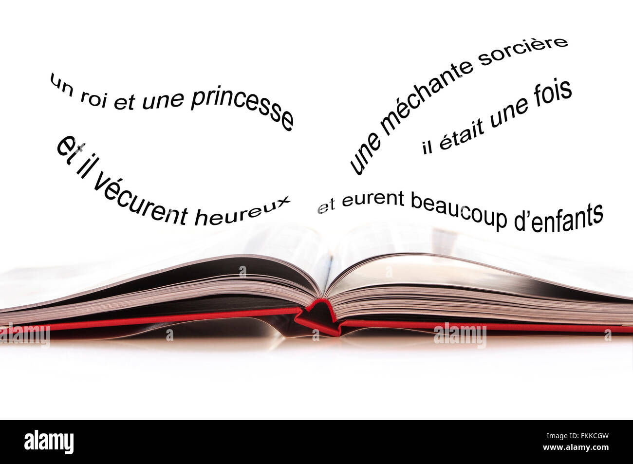 Open book, French text with the begining of an imaginary fairy tale Stock Photo