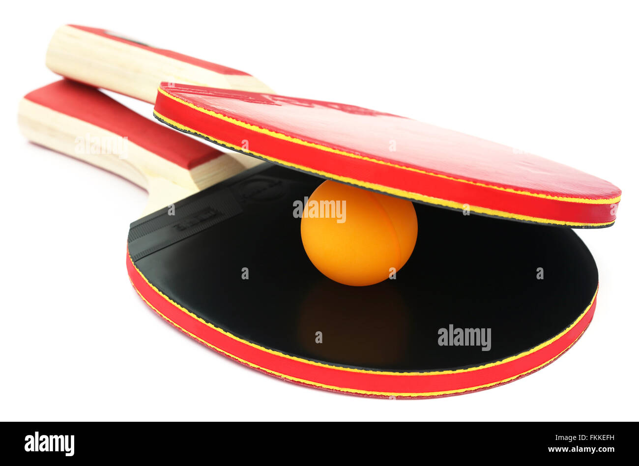 Table tennis bat and ball over white background Stock Photo