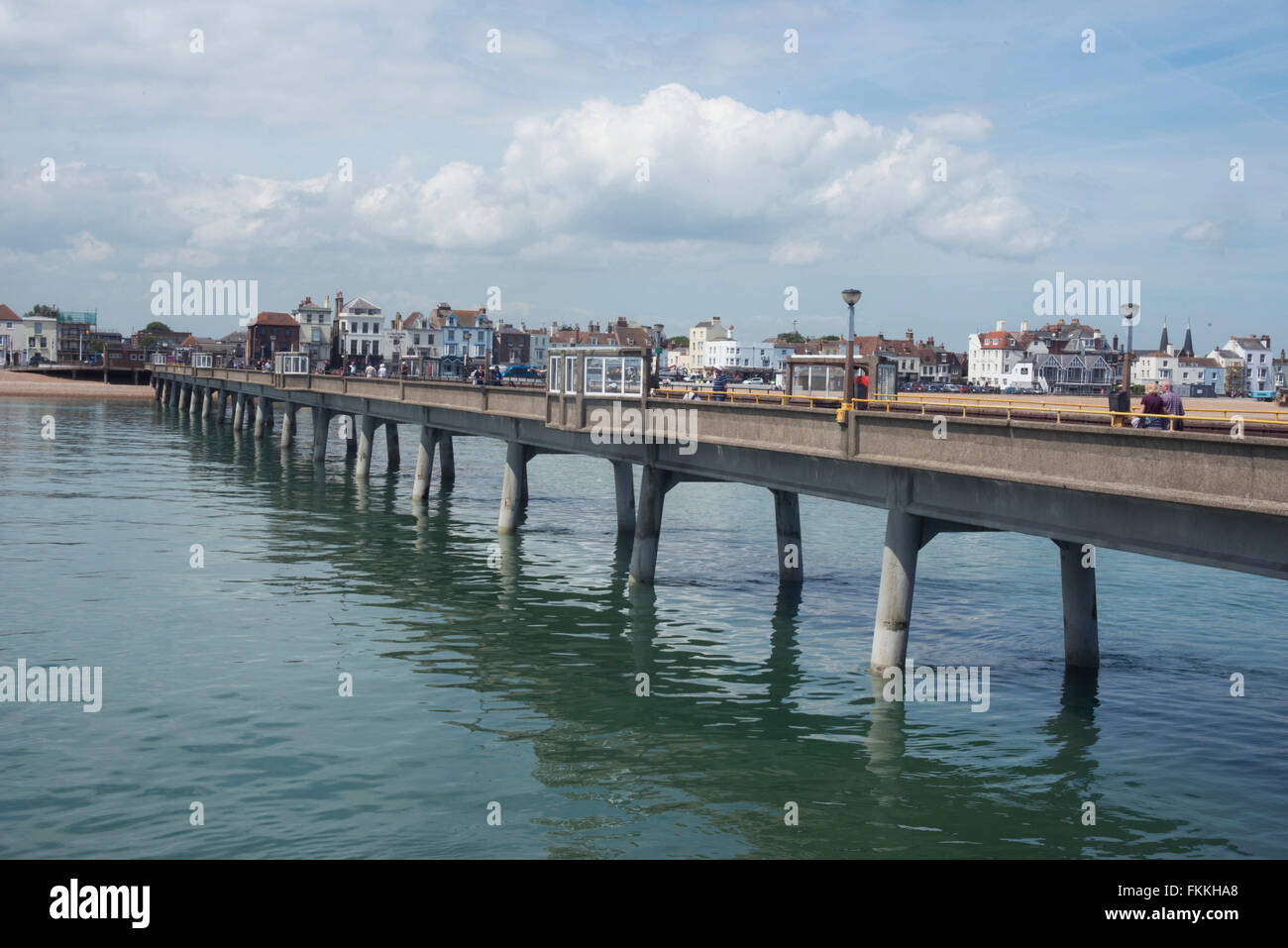 A view of The pier in Deal and blue calm waters. On a summers day. Stock Photo