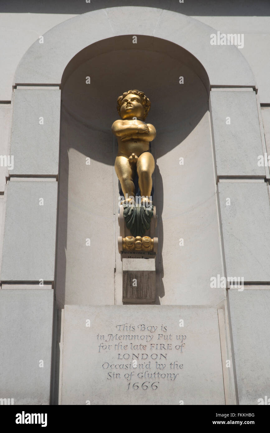 A view from below of The Golden Boy of Pye Corner, commemorating the fire of London. Stock Photo