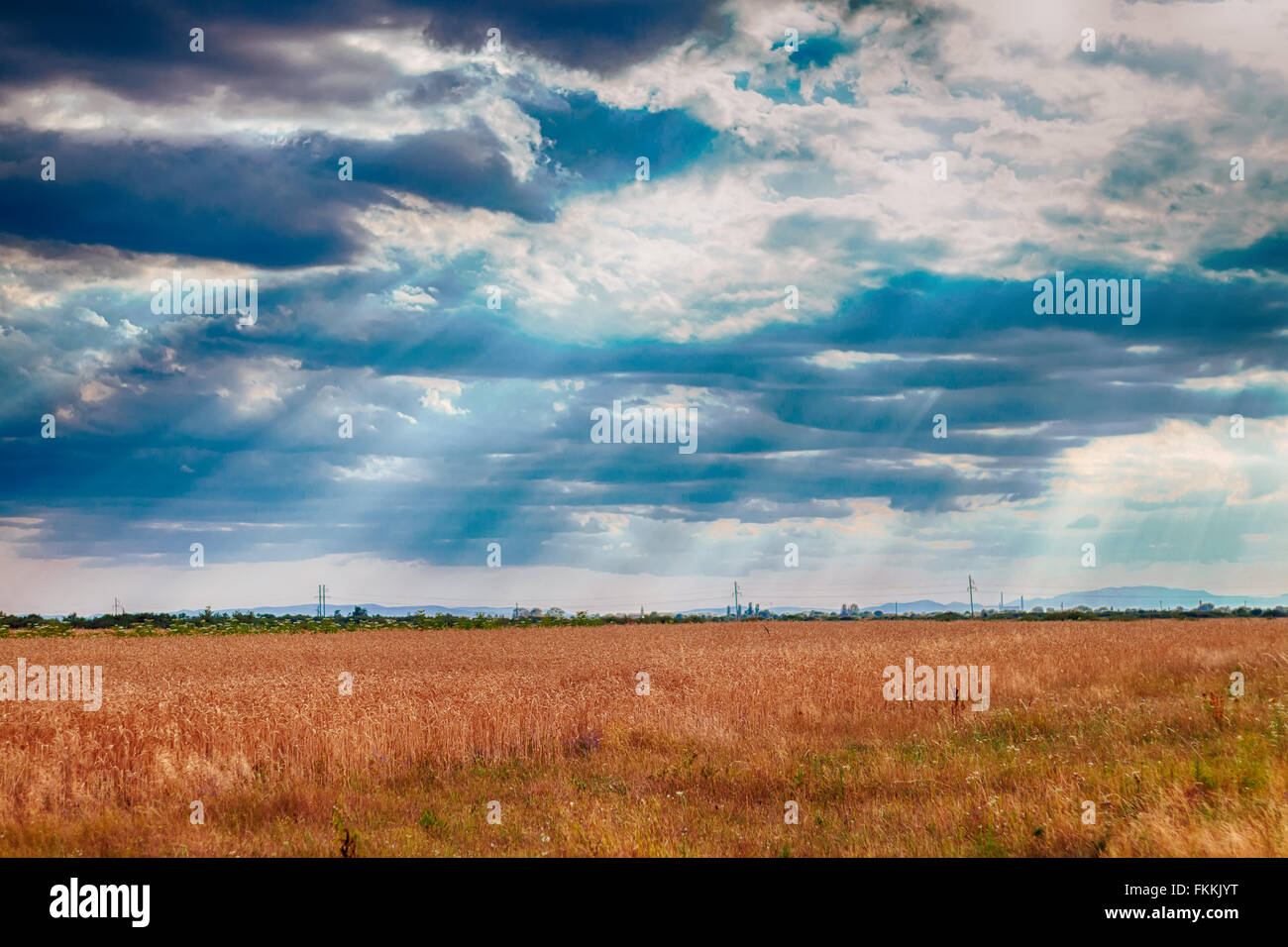 dramatic blue sky with clouds and sun rays Stock Photo - Alamy