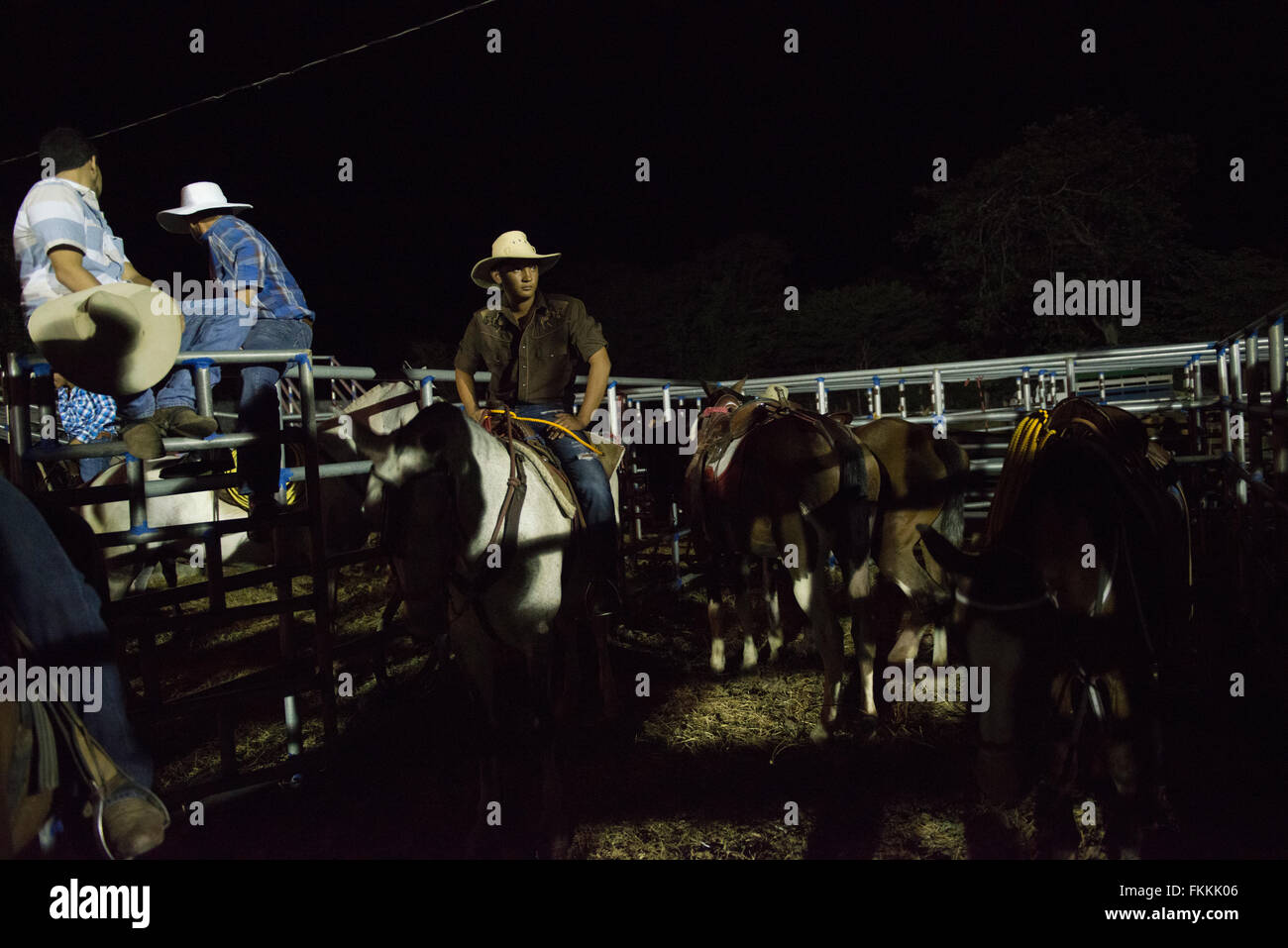 Costa Rican cowboys waiting to rope bulls at the rodeo. Stock Photo