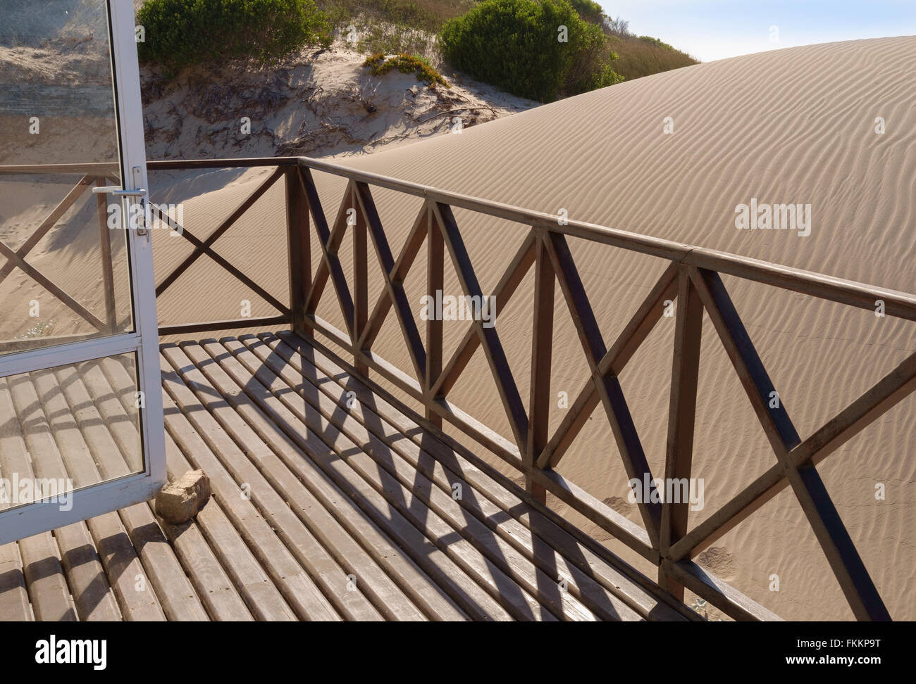 Sand dune encroaching on house in Witsand, Western Cape, South Africa Stock Photo