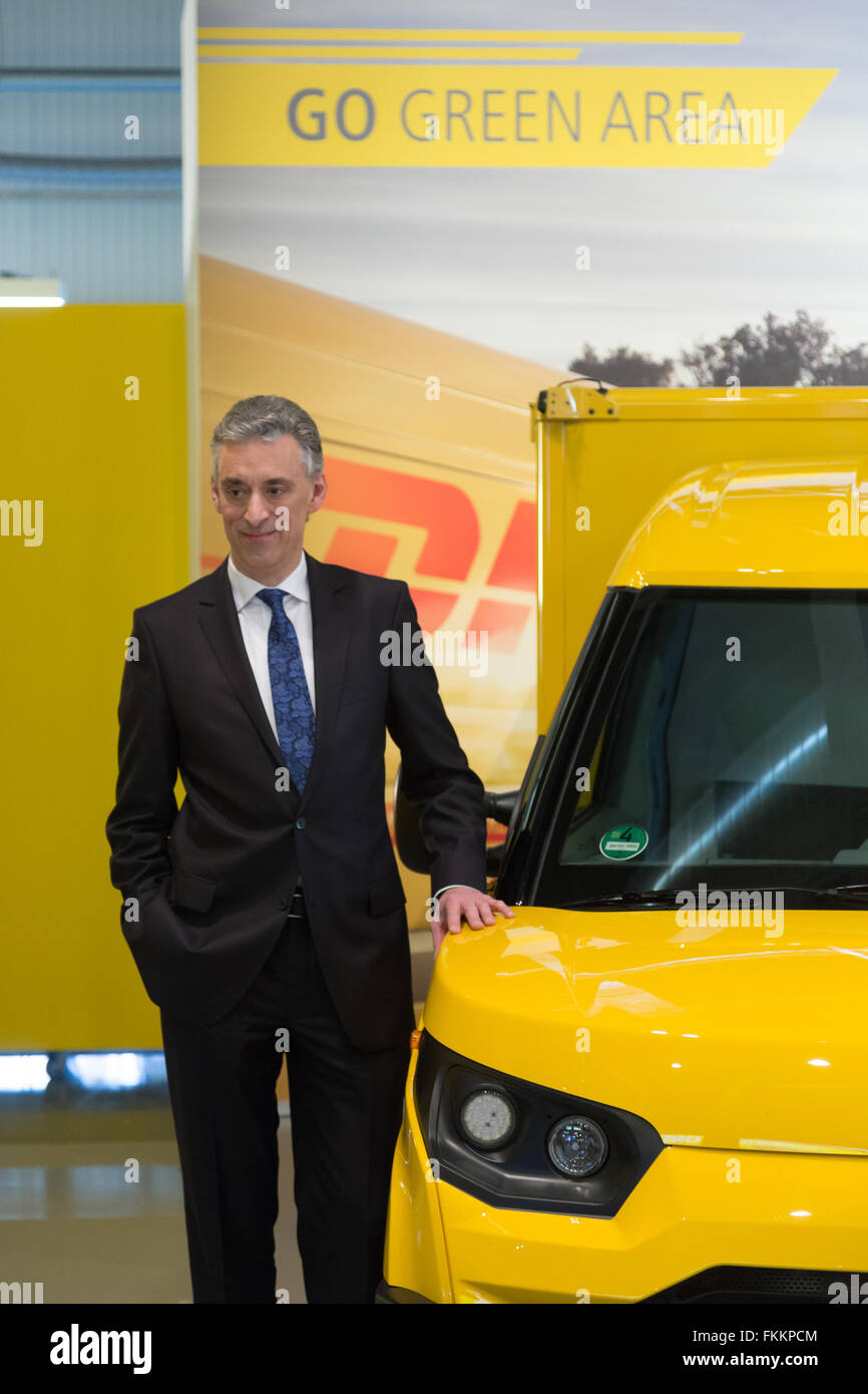 Troisdorf, Germany. 9th March, 2016. Deutsche Post DHL Group, annual news conference, Troisdorf, Germany:  CEO Frank Appel poses with electric car street scooter. Credit:  Juergen Schwarz/Alamy Live News Stock Photo