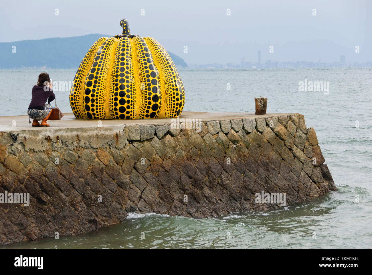 'Pumpkin' sculpture by Yayoi Kusama on Naoshima Island in Japan Stock Photo