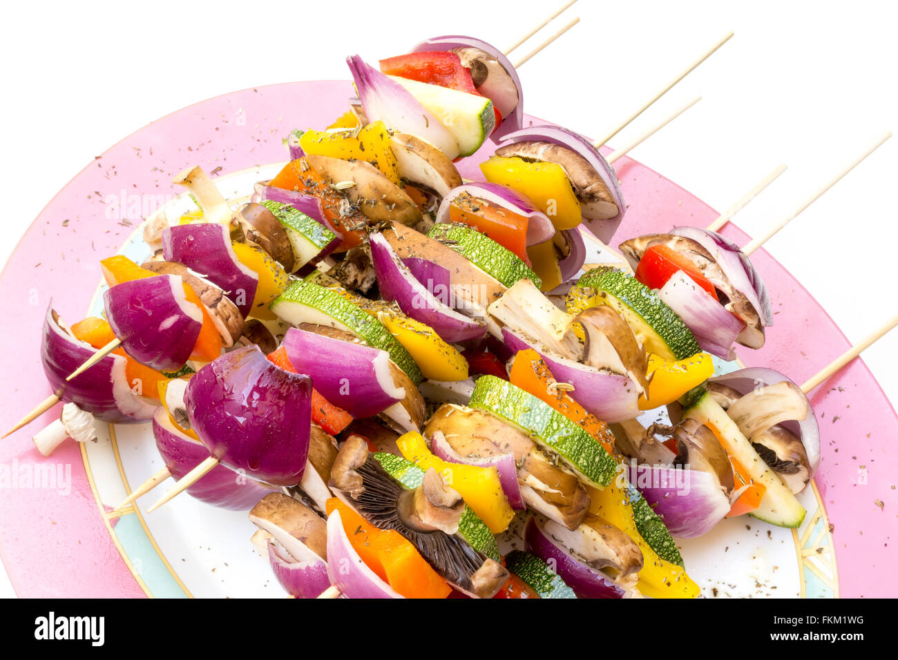 Low calorie bbq sticks with pieces of fresh vegetables as zucchini, mushroom, onion and bell