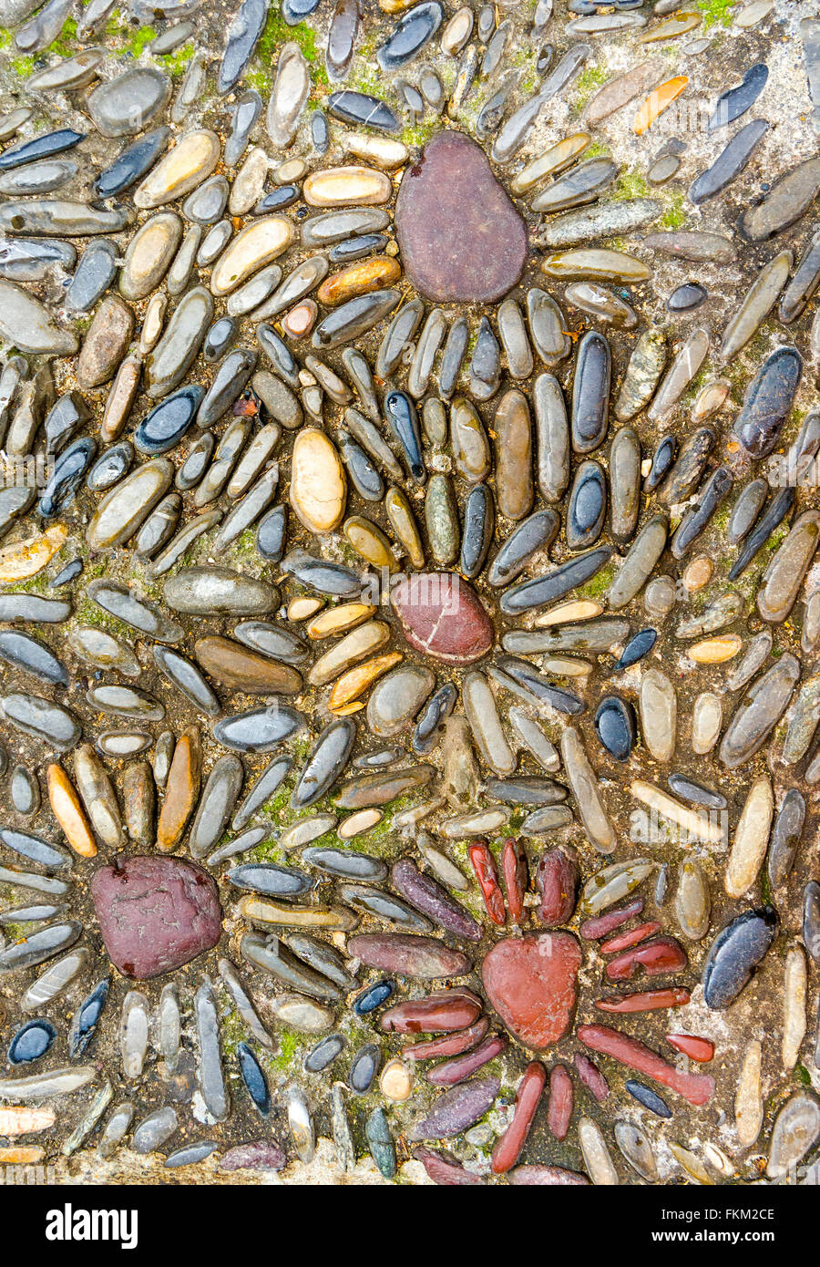 Artistic and symmetrical decorative paving stones pebbles footpath, Saint-Paul-de-Vence, France  Model Release: No.  Property Release: No. Stock Photo