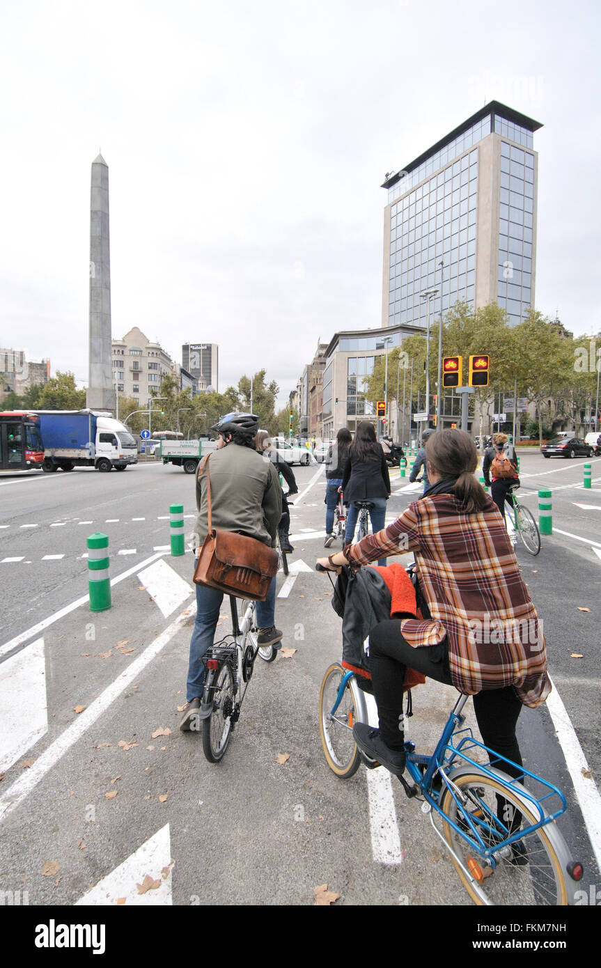 Urban cyclists. Juan Carlos I square, Diagonal avenue. Barcelona, Catalonia, Spain Stock Photo