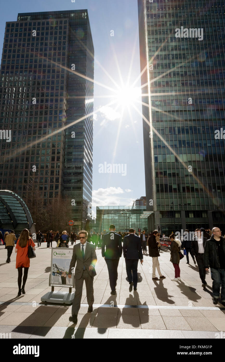 Canary Wharf office workers outside with skyscrapers London UK Stock Photo